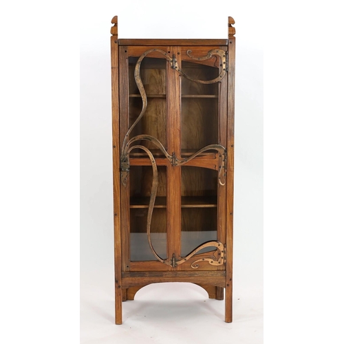 297 - Gustave Serrurier-Bovy (Belgian 18581910). An Art Nouveau copper mounted red narra wood vitrine, th... 