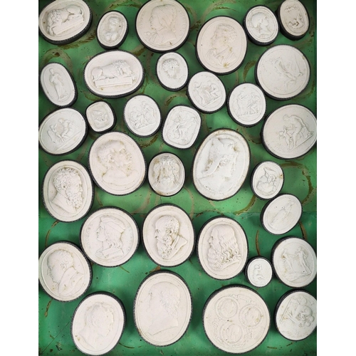 30 - A cased set of eighty three Italian Grand Tour plaster roundels after intaglios of various subjects,... 