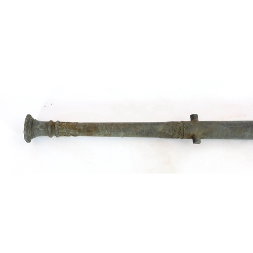 32 - An 18th century Indonesian bronze Lantaka cannon, inscription to the barrel, 125cm long