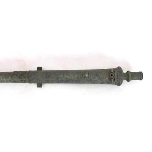 32 - An 18th century Indonesian bronze Lantaka cannon, inscription to the barrel, 125cm long