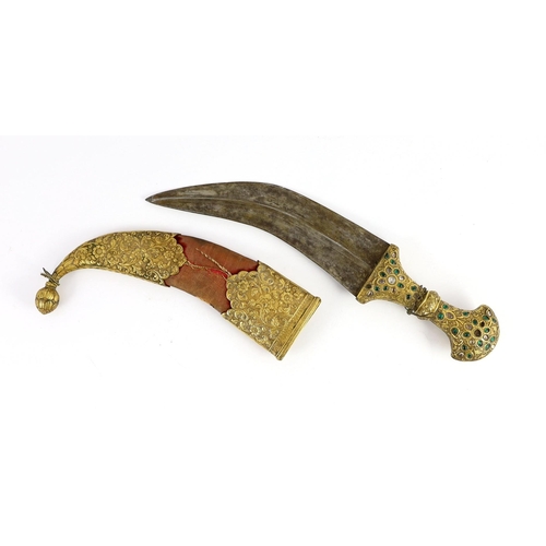 34 - An Indian gilt copper and paste mounted dagger (jambiya), Kutch, 19th century, with bejewelled folia... 