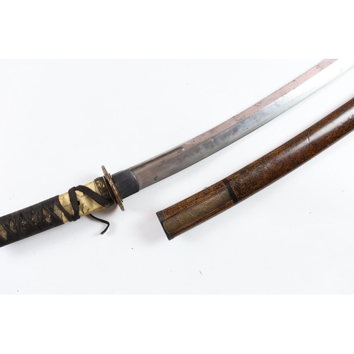 35 - A Japanese wakizashi, the tang signed Yoshitake, the 54.5cm blade inscribed to the tang, Izumo Daij... 