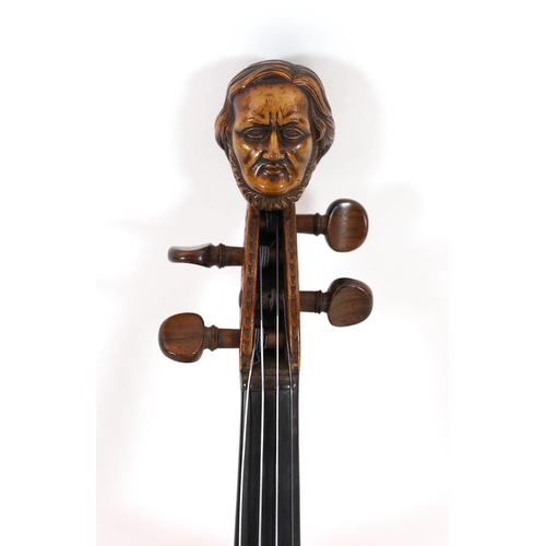 41 - An early 20th century German violin, carved with the head of Wagner, 37cm two piece back and associa... 