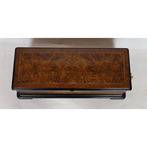 43 - A 19th century Swiss inlaid burr walnut musical box, the 12.5 inch cylinder playing 12 airs, listed ... 