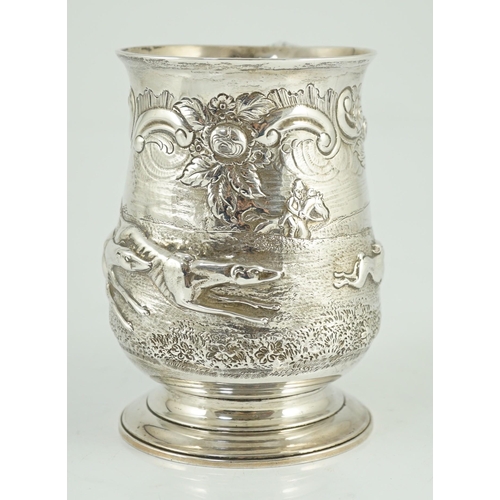 436 - A George III silver baluster mug, later embossed with continuous hare coursing scene, John Scofield,... 