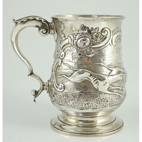 436 - A George III silver baluster mug, later embossed with continuous hare coursing scene, John Scofield,... 