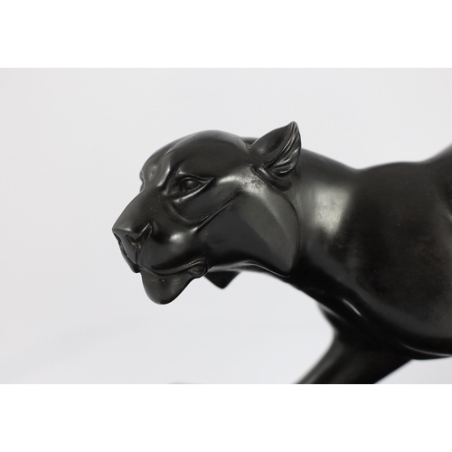 53 - Irene Rochard. A French Art Deco bronzed spelter and marble model of a black panther, standing upon ... 