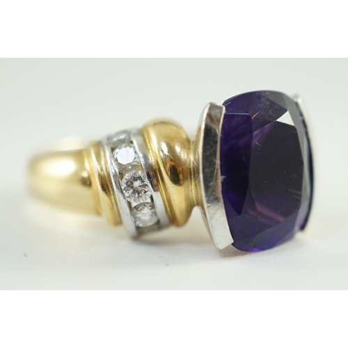 544 - A modern 18ct gold and cushion cut amethyst set dress ring, with ten stone round cut diamond set sho... 