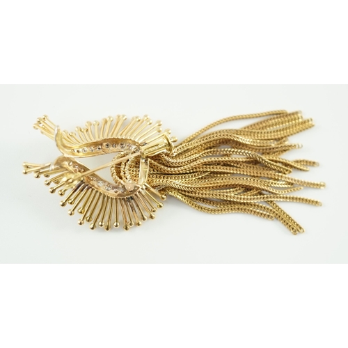 547 - A late 20th century stylish continental gold and diamond cluster set tassel brooch, of stylised hors... 