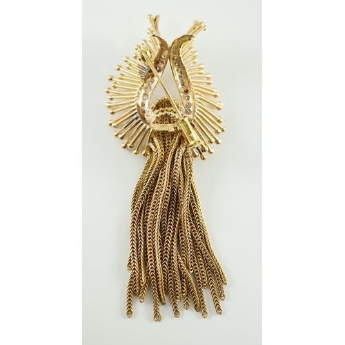 547 - A late 20th century stylish continental gold and diamond cluster set tassel brooch, of stylised hors... 