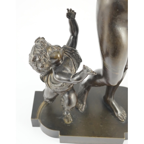 56 - A 19th century French bronze group of a muse dancing alongside a faun, 24cm wide, 52cm high