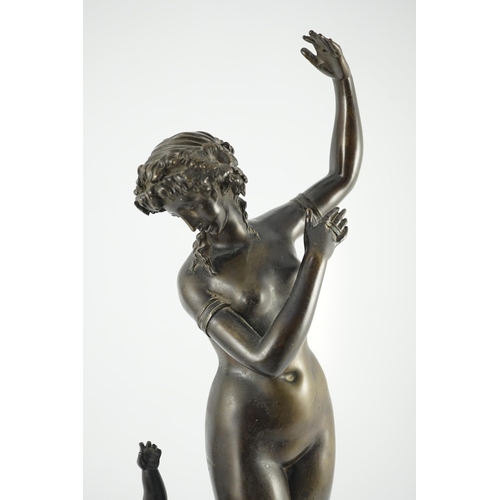 56 - A 19th century French bronze group of a muse dancing alongside a faun, 24cm wide, 52cm high