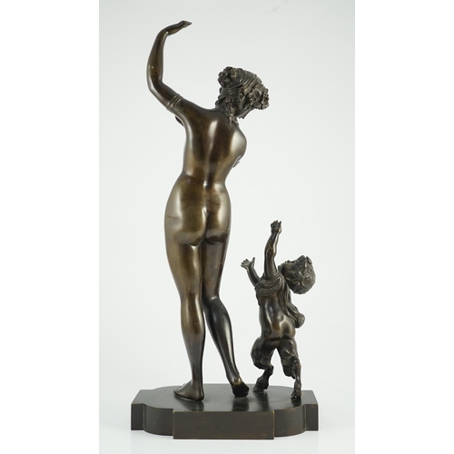 56 - A 19th century French bronze group of a muse dancing alongside a faun, 24cm wide, 52cm high