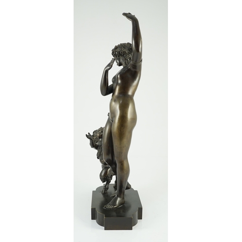 56 - A 19th century French bronze group of a muse dancing alongside a faun, 24cm wide, 52cm high