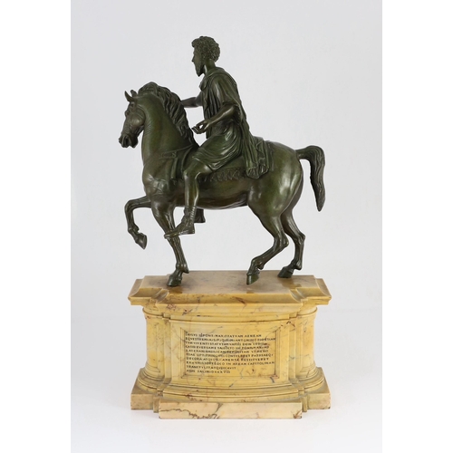 57 - After the Antique. A 19th century Italian Grand Tour bronze equestrian group, modelled as Emperor Ma... 