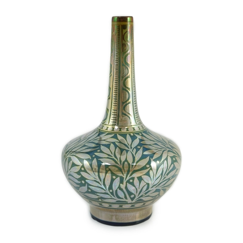 66 - A Pilkingtons Lancastrian lustre bottle vase, by William S. Mycock, painted in silver lustre with l... 