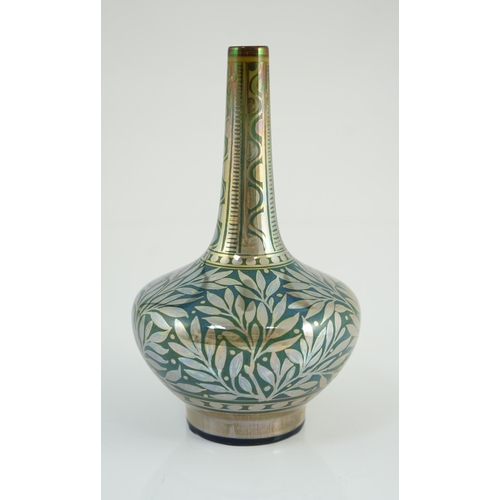 66 - A Pilkingtons Lancastrian lustre bottle vase, by William S. Mycock, painted in silver lustre with l... 