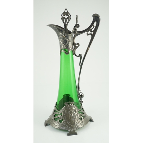 67 - An Art Nouveau WMF metal mounted green glass ewer, c.1905, cast in relief with Art Nouveau maiden's ... 