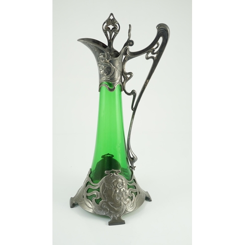 67 - An Art Nouveau WMF metal mounted green glass ewer, c.1905, cast in relief with Art Nouveau maiden's ... 