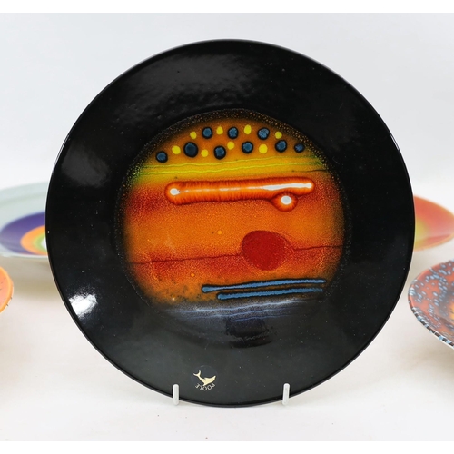 71 - Alan Clarke for Poole Pottery. A set of nine Alignment of the Planets chargers and one duplicate, ... 