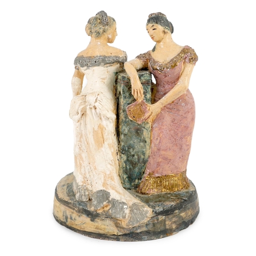 73 - § § Quentin Bell (1910-1996). A studio pottery group of two women in ballgowns, painted in coloured ... 