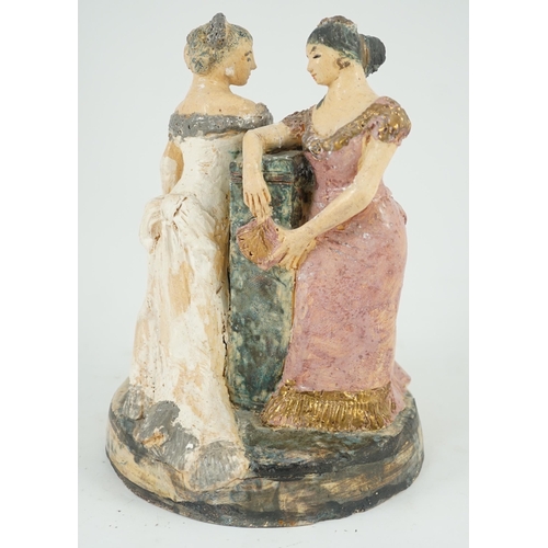 73 - § § Quentin Bell (1910-1996). A studio pottery group of two women in ballgowns, painted in coloured ... 