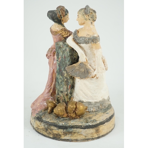 73 - § § Quentin Bell (1910-1996). A studio pottery group of two women in ballgowns, painted in coloured ... 