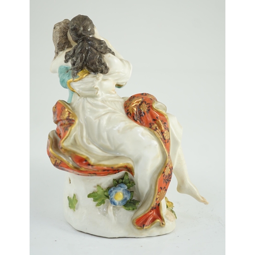 78 - A Meissen porcelain group of lovers, c.1740, seated on a flower encrusted rockwork base, crossed swo... 