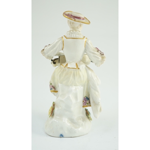 79 - A Meissen porcelain figure of a woman playing the hurdy gurdy, mid 18th century, possibly modelled b... 