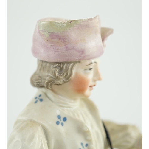 81 - A Frankenthal porcelain figure of a zither player, c.1760, modelled seated on a scrollwork base, und... 