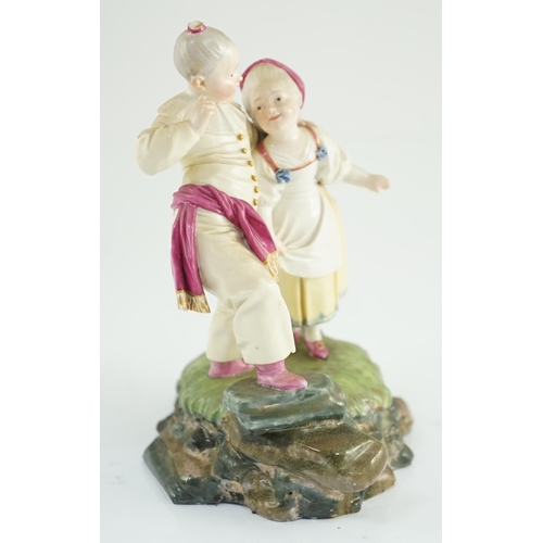 82 - A Höchst porcelain group by Melchior, modelled as a boy and girl wearing fancy dress, c.1770, the fi... 