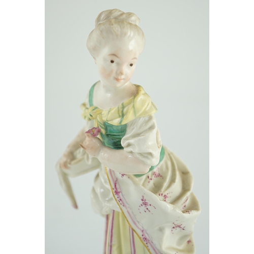 85 - A Höchst figure of a flower posy girl, c.1770-1775, modelled by J.P. Melchior, underglaze blue wheel... 