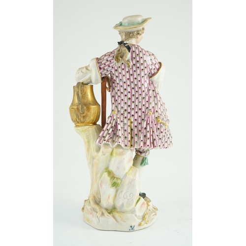 86 - A Meissen figure of a gardener, c.1770, modelled by Michel Victor Acier, holding a posy of flowers i... 