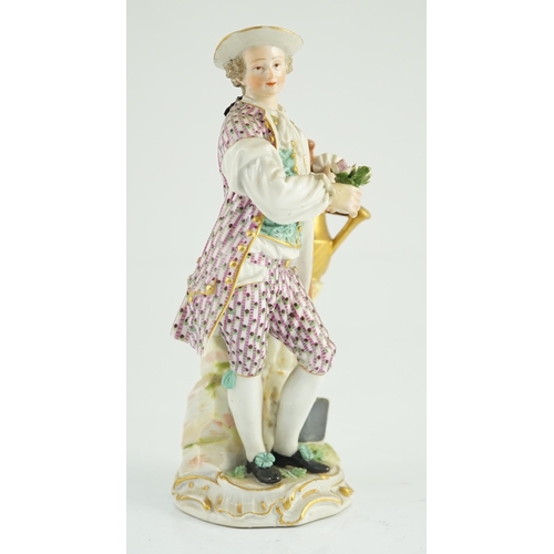 86 - A Meissen figure of a gardener, c.1770, modelled by Michel Victor Acier, holding a posy of flowers i... 