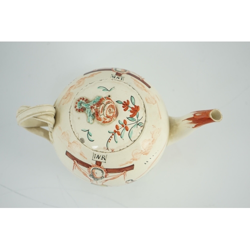 94 - A rare English creamware crucifixion teapot, c.1780-1800, each side depicting Christ with Mary Mag... 