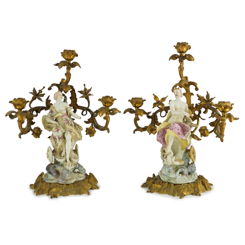 97 - A pair of large Derby porcelain and ormolu mounted Juno and Jupiter figural candelabra, the figure... 