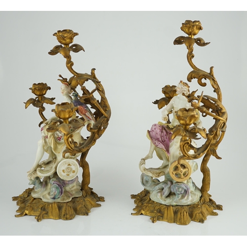 97 - A pair of large Derby porcelain and ormolu mounted Juno and Jupiter figural candelabra, the figure... 