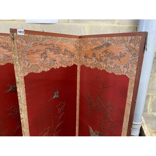 1012 - An embroidered Chinese style four fold dressing screen, each panel width 48cm, height 170cm