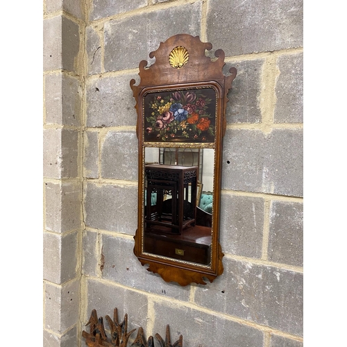 1013 - Two 18th century style painted walnut fret cut wall mirrors, larger width 35cm, height 110cm