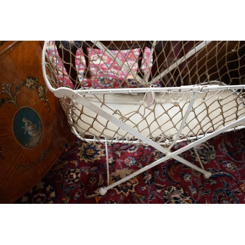 1023 - A Victorian metal folding crib, length 90cm, depth 43cm, height 134cm