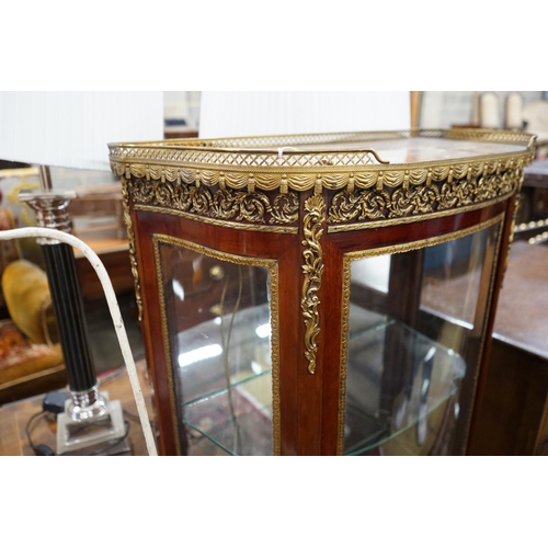 1028 - A Louis XV style gilt metal mounted marble topped bow fronted vitrine, width 67cm, depth 34cm, heigh... 