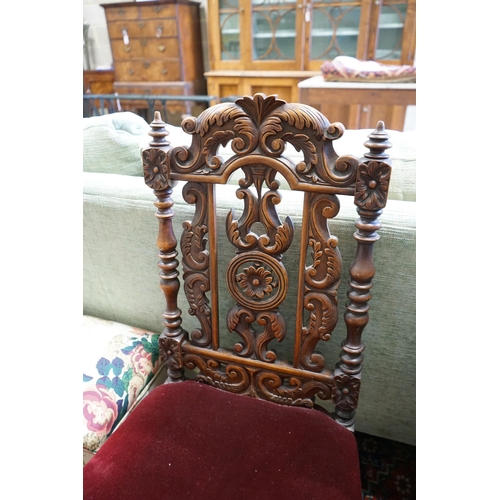 1036 - Two Victorian carved oak and walnut side chairs, larger height 92cm