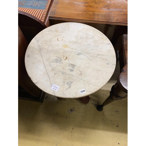 1045 - A Victorian style painted cast metal circular top marble top table, diameter 56cm, height 70cm... 