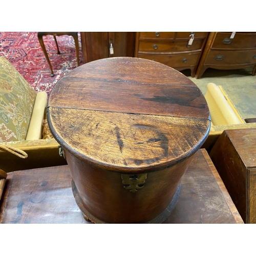 1052 - A George III style circular mahogany work box, diameter 38cm, height 47cm