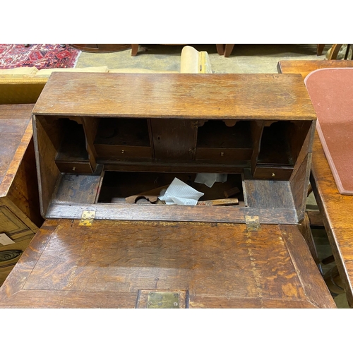 1054 - A small 18th century oak bureau, width 76cm, depth 40cm, height 94cm