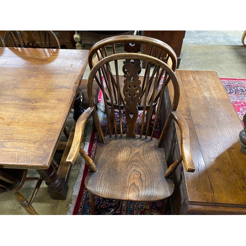 1057 - A small 18th century style rectangular oak refectory dining table, length 137cm, width 98cm, height ... 