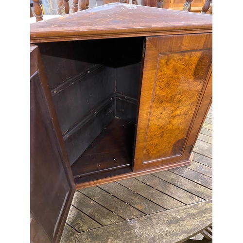 1118 - A Victorian style burr walnut hanging corner cabinet, width 63cm, depth 35cm, height 62cm