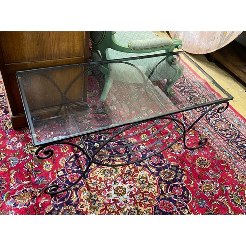 1170 - A contemporary metal and glass top rectangular wrought iron coffee table, width 110cm, depth 53cm, h... 