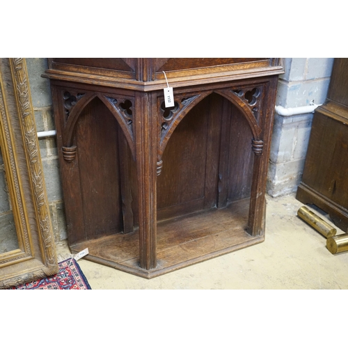 1178 - An early 20th century Gothic style carved oak side cabinet, width 118cm, depth 36cm, height 176cm... 