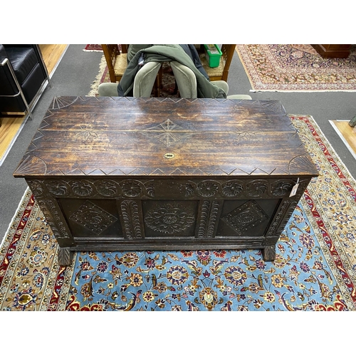 1206 - A 17th century oak coffer, altered, width 128cm, depth 59cm, height 69cm